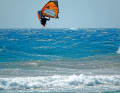 This allows the wind to reach under the board and give you additional lift - you then float along as if on a cushion of air until you reach the apex.