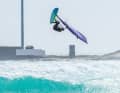 Just before the apex, Flo initiates the rotation by looking over the front shoulder, ...
