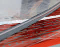 GunSails protects the bottom batten of the Seal with a rubber moulding against abrasion on the base coat of the board.