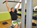 Load pull: Lower your shoulders and then pull the bar close to your chin onto your chest.