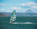 The almost 1700 metre high active Arenal volcano towers over the reservoir of the same name.