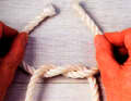 Tie an overhand knot in this position.