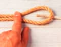 Insert the other line into the bay from below.