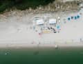 Ein Strand, ein paar Boards und Segel, und ein paar Gleichgesinnte - was könnte schöner sein?