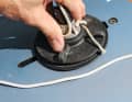 Turn the mast base plate slightly loose (not off!)