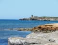 Funtana Meiga on a calm day. As soon as the mistral whistles, great waves roll into the bay.