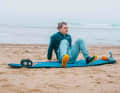 Sit on the floor, lean backwards, support yourself with your arms and place your feet in front of you so that your knees form a 90-degree angle.