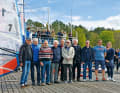50 Jahre Windsurfing Verein Berlin, sieben echte Macher aus den Gründertagen: 1. Vorsitzender Boris von Maydell (3.v.r.), Sportwart Colori Schilling (2.v.r.) und Mali Zins (2. Vorsitzende., rechts).