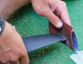 A little sandpaper to sand down any minor damage to the fin, for example