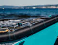 When travelling, the Artness trapeze rope lies close to the boom