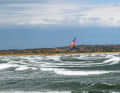 In addition to relaxed shallow water, the island also offers crisp wave spots