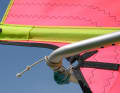 A ring instead of a pressed-in eyelet on the outhaul.