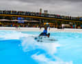 Surfing in the artificial wave at o2 Surftown MUC