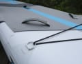 The very large luggage net hangs securely on stainless steel rings
