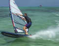 The Starboard Carve 119 Wood Sandwich in a surf test