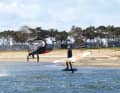 Two surf editors met up for the ultimate foil duel: wing vs. sail.