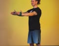 Place a loop band around your hands.  Tighten the band and move your hands as far apart as possible.  Now stretch your arms forwards, holding against the resistance exerted by the band on the back of your hands. Breathe out as you stretch.