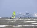 At Grüner Brink, you can surf with a view of the big ships setting off for Denmark from Puttgarden harbour.