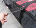 With MFC, the compression straps run all the way round and take the strain off the zip. However, the straps must be unthreaded to open the zip.