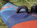 Good straps are now standard on all boards. Starboard (2) also offers extremely good cushioning pads.