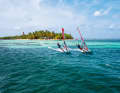 Guadeloupe is windsurfing like in front of a photo wallpaper - dreamlike spots with breathtaking colours