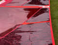 Discreet flame design along the upper leech