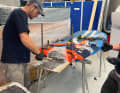 A carbon luggage rack on the foil boards is used to transport camping equipment and provisions.