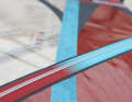 A rubber strip is glued to the bottom batten to prevent abrasion of the non skid paint when water starting