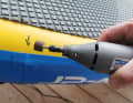 A multi-tool for grinding is helpful for the repair, but it can also be done by hand.