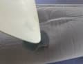 Use the preheated iron (without steam!) to first fix the patch in places
