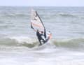 The high five: The breaking wave lip hits the board from the underside