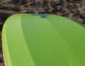 An impact-resistant plastic cover surrounds the foam core