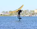 Tip: If you pull the wing towards your hip with your front hand, it is easier to grip with your back hand