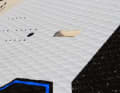 The board has a carrying handle in the deck...