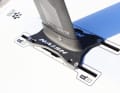 The mounting plate is secured with a small cross bolt to prevent it from shaking loose