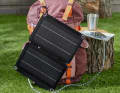 A foldable solar panel recharges smartphones and other devices even when far from a power socket
