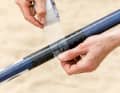 If the sail is to remain rigged for a longer period of time, you can stick some tape on the connector to prevent sand from getting in - this way you can get everything apart again after your holiday and make sure that the mast does not slip apart again when rigging (risk of breakage!).