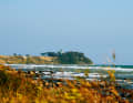 Definitely worth a detour in calm weather - Kegnæs Fyr, the old lighthouse, towers above the cliff.