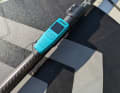 The controller is clipped onto the paddle.