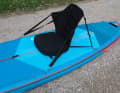 Four eyelets optionally hold a kayak seat.