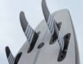 All four fins are screwed into slot boxes.