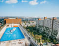 Max Matissek: "This photo became the main photo of my second project in the "True Wind" series. Here I try to windsurf in new, unusual places where it is actually not possible due to one or more physical components.  The action took place on the roof of one of the Alt-Erlaa blocks in Vienna's 23rd district."