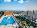 Max Matissek in the pool above Alt Erlaa