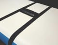 An additional fin box is attached under the centre of the board using two tensioning straps
