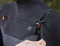 The wetsuit can be pulled tight on the chest to prevent water ingress