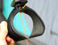 The Flymount Aero clasps the front tube of the wing and is fixed in place with a single rotary knob