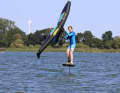 Gain momentum on a half-wind course and check the free space downwind.