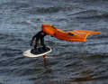Wave riding in the goofy position (right foot in front)