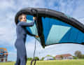2nd approach in the regular foot position. Release the rear hand from the wing...