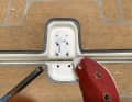 1. remove any filler or adhesive residue from the repair area and sand lightly with 150 grit until the paint is matt